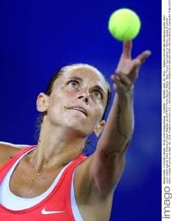 (150930) -- WUHAN, Sept. 30, 2015 -- Roberta Vinci of Italy serves during the third round match against Petra Kvitova of Czech Republic at 2015 WTA Tennis Damen Wuhan Open Tennis Tournament in Wuhan, capital of central China s Hubei Province, on Sept. 30, 2015. Roberta Vinci won 2-0. ) (SP)CHINA-WUHAN-TENNIS-WTA-WUHAN OPEN-3RD ROUND(CN) ChengxMin 