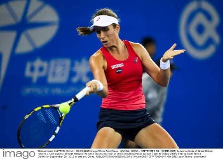 WUHAN, CHINA - SEPTEMBER 30: (CHINA OUT) Johanna Konta of Great Britain returns a shot against Simona Halep of Romania during day four of 2015 Dongfeng Motor Wuhan Open at Optics Valley International Tennis Center on September 30, 2015 in Wuhan, China.  CFP473664947 