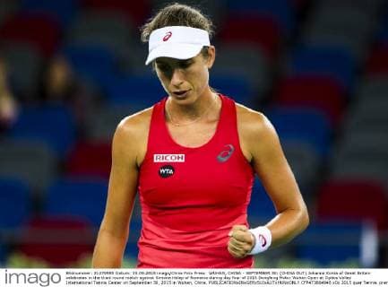WUHAN, CHINA - SEPTEMBER 30: (CHINA OUT) Johanna Konta of Great Britain celebrates in the third round match against Simona Halep of Romania during day four of 2015 Dongfeng Motor Wuhan Open at Optics Valley International Tennis Center on September 30, 2015 in Wuhan, China.  CFP473664948 