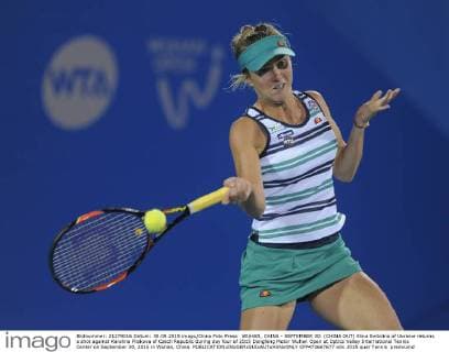 WUHAN, CHINA - SEPTEMBER 30: (CHINA OUT) Elina Svitolina of Ukraine returns a shot against Karolina Pliskova of Czech Republic during day four of 2015 Dongfeng Motor Wuhan Open at Optics Valley International Tennis Center on September 30, 2015 in Wuhan, China.  CFP473667677 