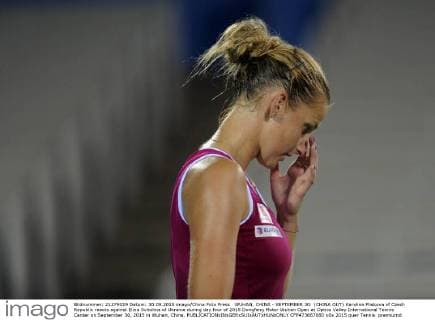 WUHAN, CHINA - SEPTEMBER 30: (CHINA OUT) Karolina Pliskova of Czech Republic reacts against Elina Svitolina of Ukraine during day four of 2015 Dongfeng Motor Wuhan Open at Optics Valley International Tennis Center on September 30, 2015 in Wuhan, China.  CFP473667680 