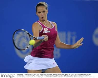 WUHAN, CHINA - SEPTEMBER 30: (CHINA OUT) Karolina Pliskova of Czech Republic returns a shot against Elina Svitolina of Ukraine during day four of 2015 Dongfeng Motor Wuhan Open at Optics Valley International Tennis Center on September 30, 2015 in Wuhan, China.  CFP473667681 