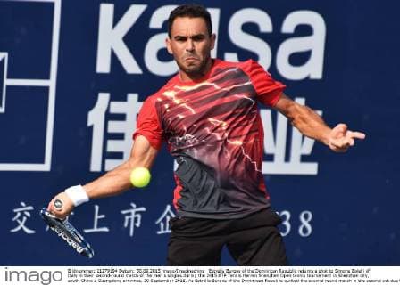 Estrella Burgos of the Dominican Republic returns a shot to Simone Bolelli of Italy in their second-round match of the men s singles during the 2015 ATP Tennis Herren Shenzhen Open tennis tournament in Shenzhen city, south China s Guangdong province, 30 September 2015. As Estrella Burgos of the Dominican Republic quitted the second-round match in the second set due to his injury, Simone Bolelli of Italy advanced to the third round match of the men s singles during the 2015 ATP Shenzhen Open tennis tournament in Shenzhen city, south China s Guangdong province, 30 September 2015. Simone Bolelli advances to third round at ATP Shenzhen Open  pbu339051_15