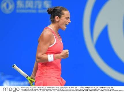 (151001) -- WUHAN, Oct. 1, 2015 -- Roberta Vinci of Italy celebrates during the quarterfinal match against Karolina Pliskova of Czech at 2015 WTA Tennis Damen Wuhan Open Tennis Tournament in Wuhan, capital of central China s Hubei Province, Oct. 1, 2015. Vinci won 2-0. ) (SP)CHINA-WUHAN-TENNIS-WTA-WUHAN OPEN (CN) ChengxMin 