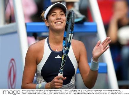 (151001) -- WUHAN, Oct. 1, 2015 -- Garbine Muguruza of Spain celebrates after her quarterfinal match against Anna Karolina Schmiedlova of Slovakia at 2015 WTA Tennis Damen Wuhan Open Tennis Tournament in Wuhan, capital of central China s Hubei Province, Oct. 1, 2015. Garbine Muguruza won 2-0.) (SP)CHINA-WUHAN-TENNIS-WTA-WUHAN OPEN (CN) ChengxMin 