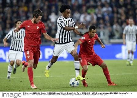 Turin, 30.09.2015 - UEFA Champions League 2015 2016 - Juventus Turin vs FC Sevilla - Juan Cuadrado-Grsegorz Krychowiak-Timothee Kolodziejczak 