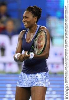 Venus Williams of the United States reacts after scoring against Johanna Konta of the United Kingdom in their quarter-final match of the women s singles during the 2015 WTA Tennis Damen Wuhan Open tennis tournament in Wuhan city, central China s Hubei province, 1 October 2015. Venus Williams of the United States defeated Johanna Konta of the United Kingdom 2-1 (6-4 3-6 7-5) in their quarter-final match of the women s singles during the 2015 WTA Wuhan Open tennis tournament in Wuhan city, central China s Hubei province, on Thursday (1 October 2015). Venus Williams ousts Johanna Konta to advance semi-final at Wuhan Open  20151001_68117