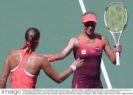 WUHAN, CHINA - OCTOBER 02: (CHINA OUT) Lucie Hradecka and Andrea Hlavackova of Czech Republic in action in the semi-finals of the doubles match against Irina-Camelia Begu and Monica Niculescu of Romania during day six of 2015 Dongfeng Motor Wuhan Open at Optics Valley International Tennis Center on October 2, 2015 in Wuhan, Hubei Province of China.  CFP473752279 