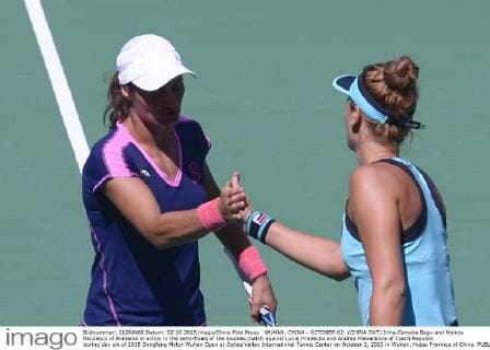 WUHAN, CHINA - OCTOBER 02: (CHINA OUT) Irina-Camelia Begu and Monica Niculescu of Romania in action in the semi-finals of the doubles match against Lucie Hradecka and Andrea Hlavackova of Czech Republic during day six of 2015 Dongfeng Motor Wuhan Open at Optics Valley International Tennis Center on October 2, 2015 in Wuhan, Hubei Province of China.  CFP473752280 