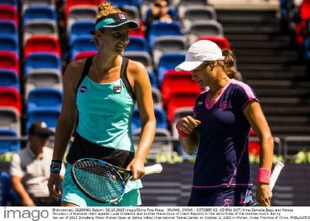WUHAN, CHINA - OCTOBER 02: (CHINA OUT) Irina-Camelia Begu and Monica Niculescu of Romania react against Lucie Hradecka and Andrea Hlavackova of Czech Republic in the semi-finals of the doubles match during day six of 2015 Dongfeng Motor Wuhan Open at Optics Valley International Tennis Center on October 2, 2015 in Wuhan, Hubei Province of China.  CFP473752283 