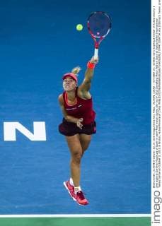 WUHAN, CHINA - OCTOBER 02: (CHINA OUT) Angelique Kerber of Russia returns a shot against Garbine Muguruza of Spain in semi-final match during day six of 2015 Dongfeng Motor Wuhan Open at Optics Valley International Tennis Center on October 2, 2015 in Wuhan, Hubei Province of China.  CFP473769724 