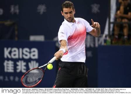 SHENZHEN, CHINA - OCTOBER 02: (CHINA OUT) Marin Cilic of Croatia returns a shot against Hyeon Chung of South Korea in quarter-final match during day five of the 2015 Shenzhen Open ATP Tennis Herren World Tour at Longgang Sports Center on October 2, 2015 in Shenzhen, Guangdong Province of China.  CFP473769641 