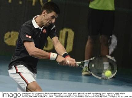 Oct. 2, 2015 - Bangkok, thailand - Tennis player Novak Djokovic of Serbia returns the ball against Rafael Nadal of Spain during the exhibition match at the Indoor Stadium Huamark in Bangkok, Thailand on October 2, 2015. Djokovic wins 2-0 set, score 6-4, 6-2. Nadal v Djokovic Exhibition Match in Bangkok  - ZUMAn230