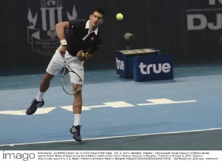 Oct. 2, 2015 - Bangkok, thailand - Tennis player Novak Djokovic of Serbia serves against Rafael Nadal of Spain during the exhibition match at the Indoor Stadium Huamark in Bangkok, Thailand on October 2, 2015. Djokovic wins 2-0 set, score 6-4, 6-2. Nadal v Djokovic Exhibition Match in Bangkok  - ZUMAn230