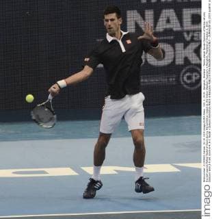 Oct. 2, 2015 - Bangkok, thailand - Tennis player Novak Djokovic of Serbia returns the ball against Rafael Nadal of Spain during the exhibition match at the Indoor Stadium Huamark in Bangkok, Thailand on October 2, 2015. Djokovic wins 2-0 set, score 6-4, 6-2. Nadal v Djokovic Exhibition Match in Bangkok  - ZUMAn230