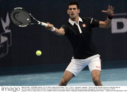 Oct. 2, 2015 - Bangkok, thailand - Tennis player Novak Djokovic of Serbia returns the ball against Rafael Nadal of Spain during the exhibition match at the Indoor Stadium Huamark in Bangkok, Thailand on October 2, 2015. Djokovic wins 2-0 set, score 6-4, 6-2. Nadal v Djokovic Exhibition Match in Bangkok  - ZUMAn230