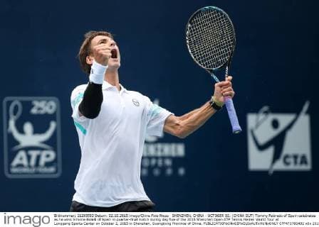 SHENZHEN, CHINA - OCTOBER 02: (CHINA OUT) Tommy Robredo of Spain celebrates as he wins Simone Bolelli of Spain in quarter-final match during day five of the 2015 Shenzhen Open ATP Tennis Herren World Tour at Longgang Sports Center on October 2, 2015 in Shenzhen, Guangdong Province of China.  CFP473760402 