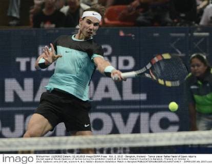 Oct. 2, 2015 - Bangkok, thailand - Tennis player Rafael Nadal of Spain returns the ball against Novak Djokovic of Serbia during the exhibition match at the Indoor Stadium Huamark in Bangkok, Thailand on October 2, 2015. Djokovic wins 2-0 set, score 6-4, 6-2. Nadal v Djokovic Exhibition Match in Bangkok  - ZUMAn230