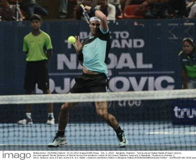 Oct. 2, 2015 - Bangkok, thailand - Tennis player Rafael Nadal of Spain returns the ball against Novak Djokovic of Serbia during the exhibition match at the Indoor Stadium Huamark in Bangkok, Thailand on October 2, 2015. Djokovic wins 2-0 set, score 6-4, 6-2. Nadal v Djokovic Exhibition Match in Bangkok  - ZUMAn230