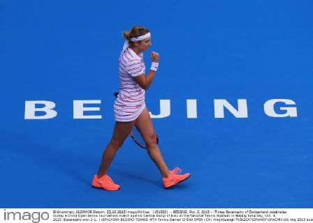 (151003) -- BEIJING, Oct. 3, 2015 -- Timea Bacsinszky of Switzerland celebrates during a China Open tennis tournament match against Camila Giorgi of Italy at the National Tennis Stadium in Beijing Saturday, Oct. 3, 2015. Bacsinszky won 2-1. ) (SP)CHINA-BEIJING-TENNIS WTA Tennis Damen CHINA OPEN (CN) XingxGuangli 