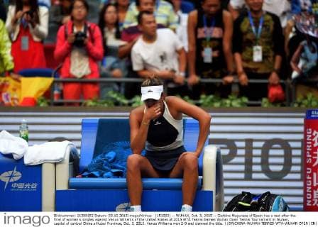 (151003) -- WUHAN, Oct. 3, 2015 -- Garbine Muguruza of Spain has a rest after the final of women s singles against Venus Williams of the United States at 2015 WTA Tennis Damen Wuhan Open Tennis Tournament in Wuhan, capital of central China s Hubei Province, Oct. 3, 2015. Venus Williams won 2-0 and claimed the title. ) (SP)CHINA-WUHAN-TENNIS-WTA-WUHAN OPEN (CN) ChengxMin 