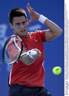 BEIJING, CHINA - OCTOBER 03: (CHINA OUT) Djordje Djokovic of Serbia returns a shot against Simone Bolelli of Italy in Singles Qualifying on day one of 2015 China Open at the China National Tennis Center on October 3, 2015 in Beijing, China.  CFP473800212 