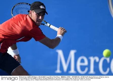 BEIJING, CHINA - OCTOBER 03: (CHINA OUT) Djordje Djokovic of Serbia returns a shot against Simone Bolelli of Italy in Singles Qualifying on day one of 2015 China Open at the China National Tennis Center on October 3, 2015 in Beijing, China.  CFP473800213 
