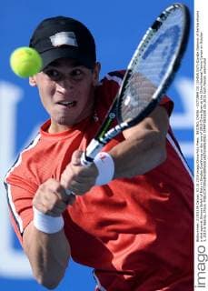 BEIJING, CHINA - OCTOBER 03: (CHINA OUT) Djordje Djokovic of Serbia returns a shot against Simone Bolelli of Italy in Singles Qualifying on day one of 2015 China Open at the China National Tennis Center on October 3, 2015 in Beijing, China.  CFP473800208 