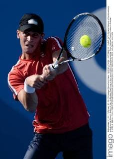 BEIJING, CHINA - OCTOBER 03: (CHINA OUT) Djordje Djokovic of Serbia returns a shot against Simone Bolelli of Italy in Singles Qualifying on day one of 2015 China Open at the China National Tennis Center on October 3, 2015 in Beijing, China.  CFP473800204 