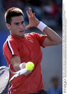BEIJING, CHINA - OCTOBER 03: (CHINA OUT) Djordje Djokovic of Serbia returns a shot against Simone Bolelli of Italy in Singles Qualifying on day one of 2015 China Open at the China National Tennis Center on October 3, 2015 in Beijing, China.  CFP473800205 