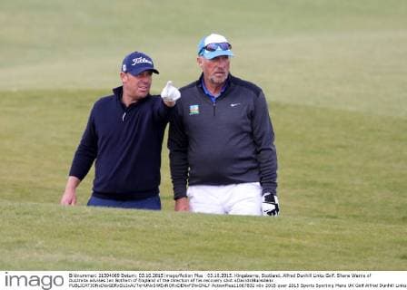 03.10.2015. Kingsbarns, Scotland. Alfred Dunhill Links Golf. Shane Warne of Australia advises Ian Botham of England of the direction of his recovery shot xDavidxBlunsdenx  ActionPlus11667832