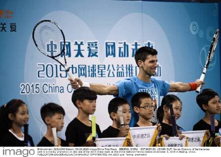 BEIJING, CHINA - OCTOBER 03: (CHINA OUT) Novak Djokovic of Serbia takes part in a charity promotion on day one of the 2015 China Open at the China National Tennis Centre on October 3, 2015 in Beijing, China.  CFP473807852 