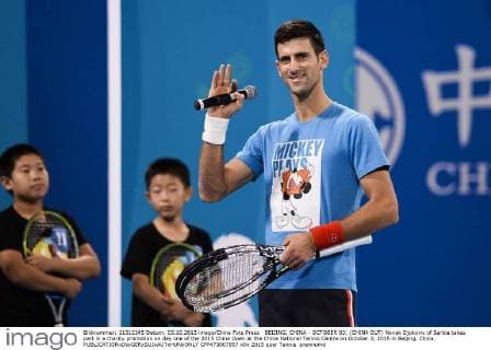 BEIJING, CHINA - OCTOBER 03: (CHINA OUT) Novak Djokovic of Serbia takes part in a charity promotion on day one of the 2015 China Open at the China National Tennis Centre on October 3, 2015 in Beijing, China.  CFP473807857 