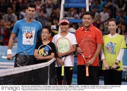 BEIJING, CHINA - OCTOBER 03: (CHINA OUT) Novak Djokovic of Serbia takes part in a charity promotion on day one of the 2015 China Open at the China National Tennis Centre on October 3, 2015 in Beijing, China.  CFP473809520 