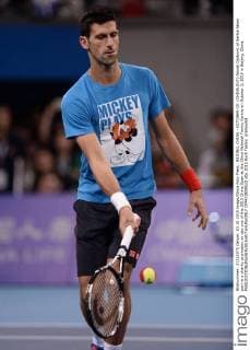 BEIJING, CHINA - OCTOBER 03: (CHINA OUT) Novak Djokovic of Serbia takes part in a charity promotion on day one of the 2015 China Open at the China National Tennis Centre on October 3, 2015 in Beijing, China.  CFP473809522 