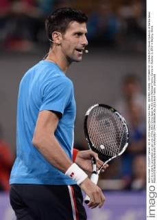 BEIJING, CHINA - OCTOBER 03: (CHINA OUT) Novak Djokovic of Serbia takes part in a charity promotion on day one of the 2015 China Open at the China National Tennis Centre on October 3, 2015 in Beijing, China.  CFP473809524 