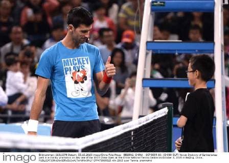 BEIJING, CHINA - OCTOBER 03: (CHINA OUT) Novak Djokovic of Serbia takes part in a charity promotion on day one of the 2015 China Open at the China National Tennis Centre on October 3, 2015 in Beijing, China.  CFP473809525 