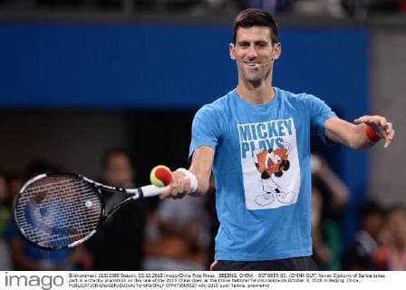 BEIJING, CHINA - OCTOBER 03: (CHINA OUT) Novak Djokovic of Serbia takes part in a charity promotion on day one of the 2015 China Open at the China National Tennis Centre on October 3, 2015 in Beijing, China.  CFP473809527 