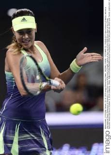 BEIJING, CHINA - OCTOBER 03: (CHINA OUT) Ana Ivanovic of Serbia returns a shot against Casey Dellacqua of Australia in the first round of Women s Singles match on day one of the 2015 China Open at the China National Tennis Centre on October 3, 2015 in Beijing, China.  CFP473812564 