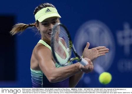 BEIJING, CHINA - OCTOBER 03: (CHINA OUT) Ana Ivanovic of Serbia returns a shot against Casey Dellacqua of Australia in the first round of Women s Singles match on day one of the 2015 China Open at the China National Tennis Centre on October 3, 2015 in Beijing, China.  CFP473812566 