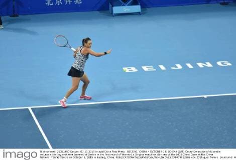 BEIJING, CHINA - OCTOBER 03: (CHINA OUT) Casey Dellacqua of Australia returns a shot against Ana Ivanovic of Serbia in the first round of Women s Singles match on day one of the 2015 China Open at the China National Tennis Centre on October 3, 2015 in Beijing, China.  CFP473812606 