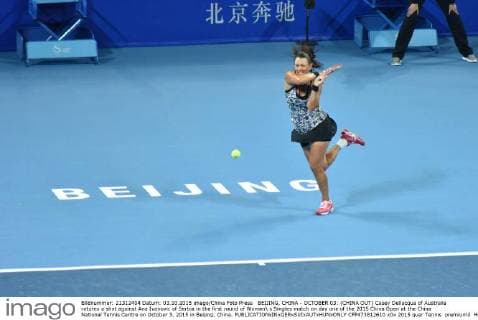 BEIJING, CHINA - OCTOBER 03: (CHINA OUT) Casey Dellacqua of Australia returns a shot against Ana Ivanovic of Serbia in the first round of Women s Singles match on day one of the 2015 China Open at the China National Tennis Centre on October 3, 2015 in Beijing, China.  CFP473812610 