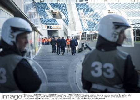 - GENT, BELGIUM: Riot police watch as stewards surround protesting Brugge fans after the Jupiler Pro League match between KAA Gent and Club Brugge, in Gent, Sunday 04 October 2015, on the 10th day of the Belgian soccer championship. JASPERxJACOBS  x04714254x