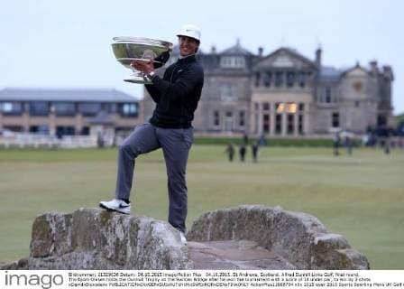 04.10.2015. St Andrews, Scotland. Alfred Dunhill Links Golf, final round. Thorbjorn Olesen holds the Dunhull Trophy on the Swilcan Bridge after he won the tournament with a score of 18 under par, to win by 2 shots xDavidxBlunsdenx  ActionPlus11668794