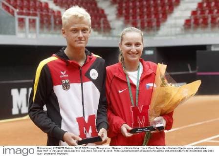 Germany s Nicola Kuhn (l) and Czech Republic s Marketa Vondrousova celebrates their MVP in the Junior Davis and Fed Cup 2015. October 4, 2015.  (20151004303)