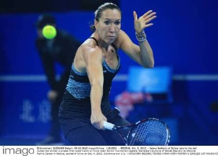 (151005) -- BEIJING, Oct. 5, 2015 -- Jelena Jankovic of Serbia returns the ball during the women s singles first round match of China Open Tennis Tournament against Dominika Cibulkova of Slovak Republic at National Tennis Center in Beijing, capital of China on Oct. 4, 2015. Cibulkova won 2-1. ) (SP)CHINA-BEIJING-TENNIS-CHINA OPEN-WOMEN S SINGLES-1ST ROUND(CN) XingxGuangli 