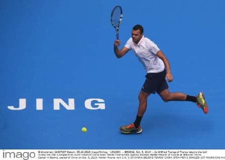 (151005) -- BEIJING, Oct. 5, 2015 -- Jo-Wilfried Tsonga of France returns the ball during the men s singles first round match of China Open Tennis Tournament against Andreas Haider-Maurer of Austria at National Tennis Center in Beijing, capital of China on Oct. 5, 2015. Haider-Maurer won 2-0. ) (SP)CHINA-BEIJING-TENNIS-CHINA OPEN-MEN S SINGLES-1ST ROUND(CN) XingxGuangli 