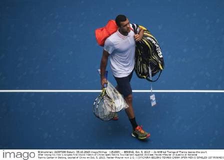 (151005) -- BEIJING, Oct. 5, 2015 -- Jo-Wilfried Tsonga of France leaves the court after losing his men s singles first round match of China Open Tennis Tournament against Andreas Haider-Maurer of Austria at National Tennis Center in Beijing, capital of China on Oct. 5, 2015. Haider-Maurer won 2-0. ) (SP)CHINA-BEIJING-TENNIS-CHINA OPEN-MEN S SINGLES-1ST ROUND(CN) XingxGuangli 