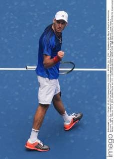 (151005) -- BEIJING, Oct. 5, 2015 -- Andreas Haider-Maurer of Austria reacts during the men s singles first round match of China Open Tennis Tournament against Jo-Wilfried Tsonga of France at National Tennis Center in Beijing, capital of China on Oct. 5, 2015. Haider-Maurer won 2-0. ) (SP)CHINA-BEIJING-TENNIS-CHINA OPEN-MEN S SINGLES-1ST ROUND(CN) XingxGuangli 