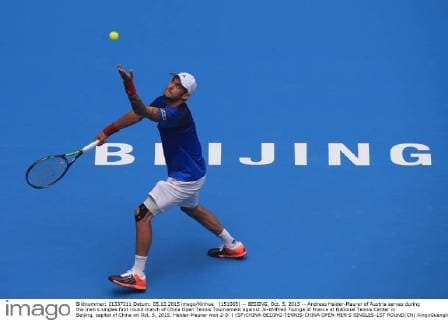 (151005) -- BEIJING, Oct. 5, 2015 -- Andreas Haider-Maurer of Austria serves during the men s singles first round match of China Open Tennis Tournament against Jo-Wilfried Tsonga of France at National Tennis Center in Beijing, capital of China on Oct. 5, 2015. Haider-Maurer won 2-0. ) (SP)CHINA-BEIJING-TENNIS-CHINA OPEN-MEN S SINGLES-1ST ROUND(CN) XingxGuangli 